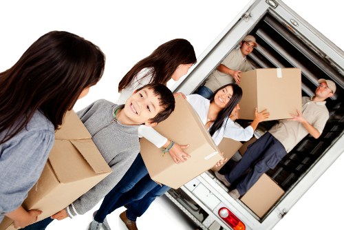 Staff reviewing a storage service issue with records
